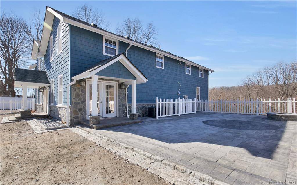 This completely renovated five bedroom home offers exceptional space and versatility, perfect for a large family or anyone who loves to host.