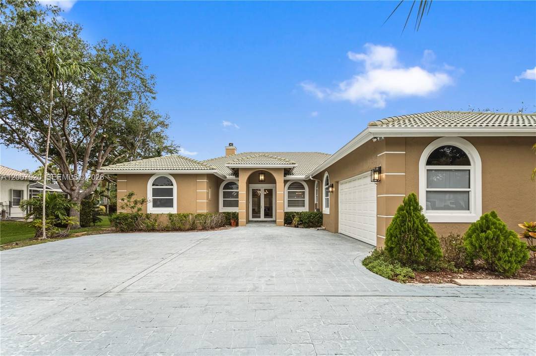 Beautifully well maintained home sitting on nearly 1 acre with NO HOA.