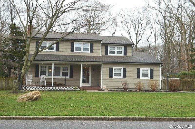 Brand new siding, shutters and gutters as well as a front porch welcome you and your guests to this fabulous 4 bedroom, 2.