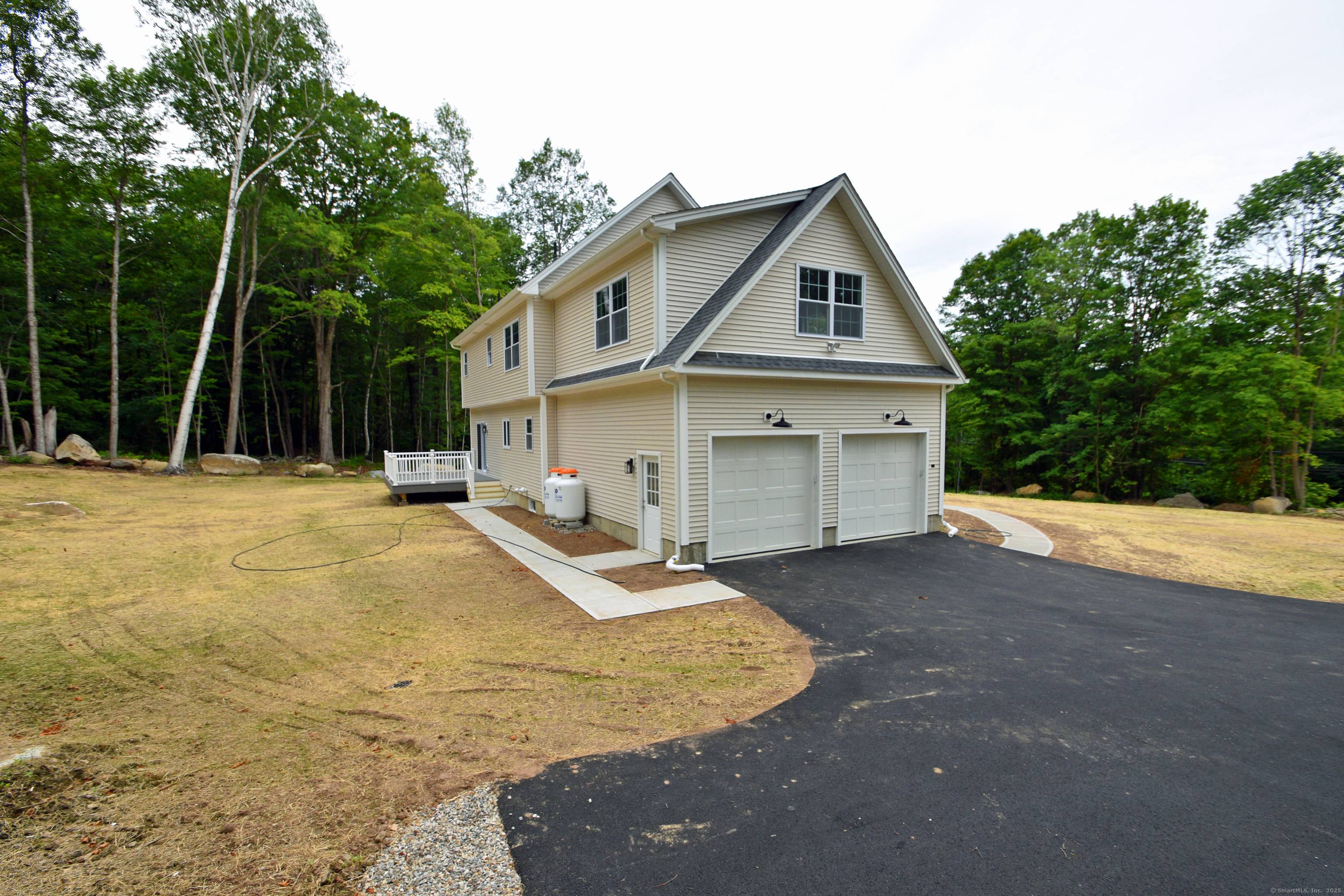 NEW 2570 SQUARE FEET 4 BEDROOM COLONIAL SET ON 1.