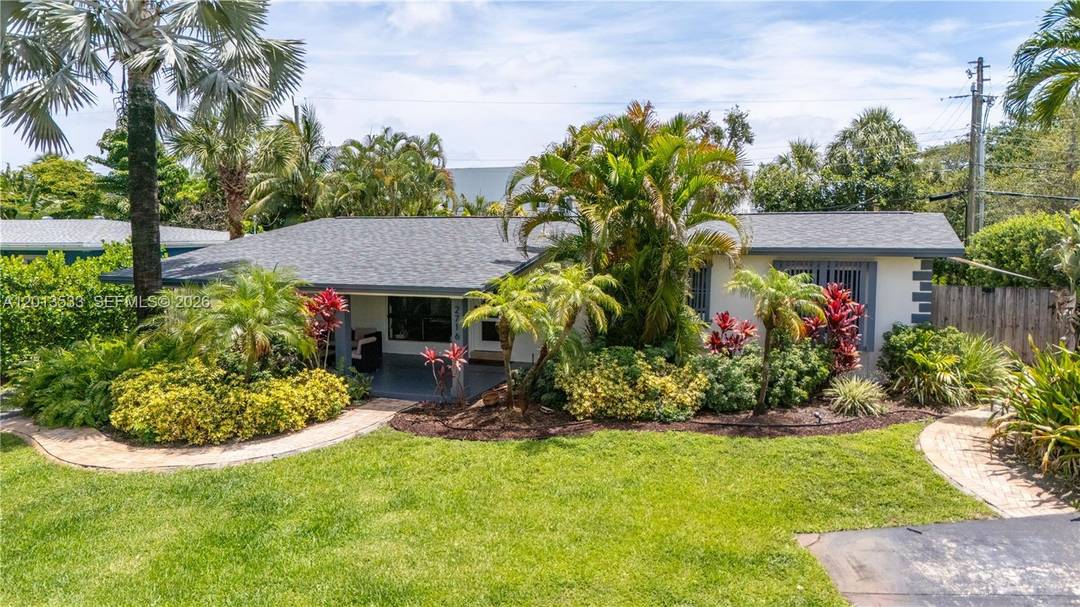 Fully updated Wilton Manors home with no HOA, offering a private backyard and flexible layout with Airbnb potential.