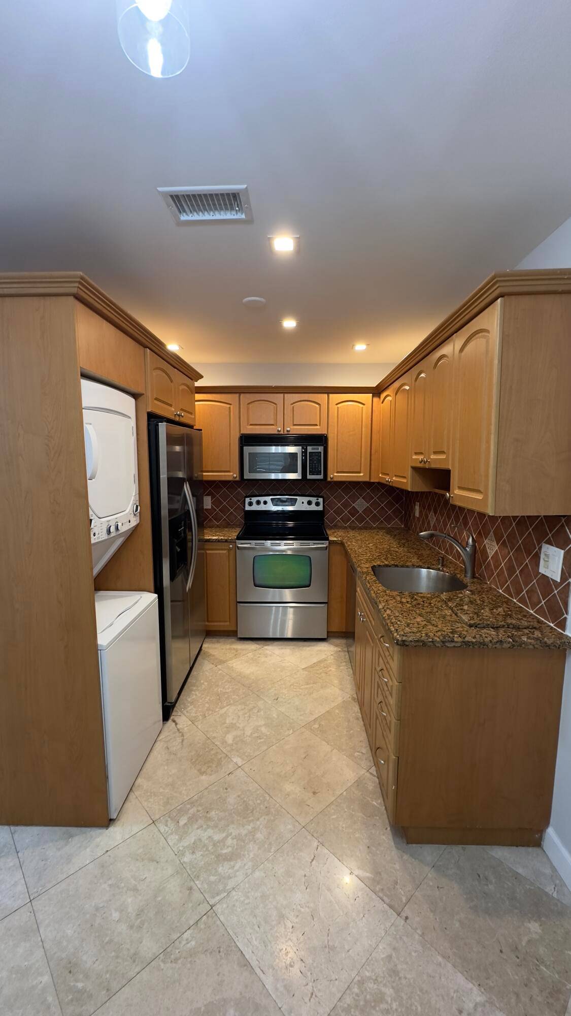 This beautifully maintained 2 bedroom, 1 bath villa with private screened in patio.