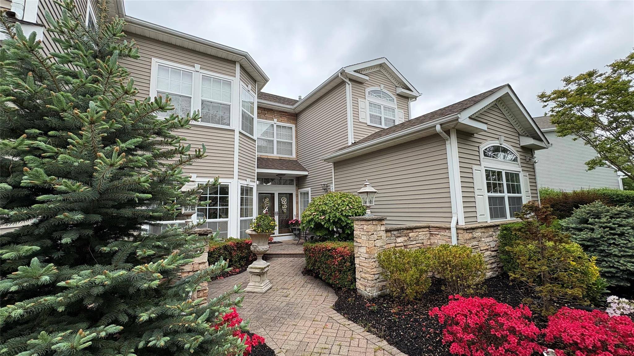 Welcome to this beautifully updated Fairfield Model, nestled on a large lot with breathtaking views of the Willow Creek Golf course.
