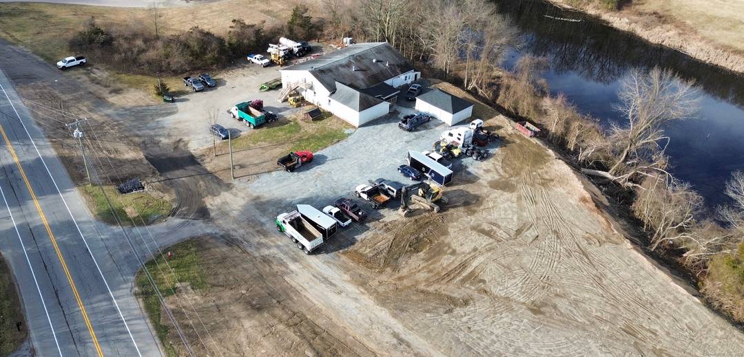 Zoned commercial and currently being utilized as a car dealership this property may be used for other applications.