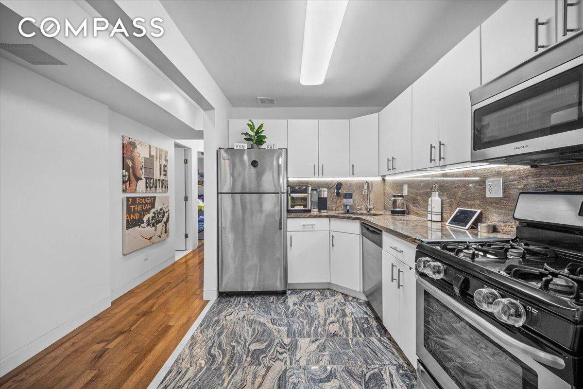 Welcome to 1477 Prospect Avenue, Unit 2 a fully renovated, 931 sq ft smart home designed for modern luxury living.