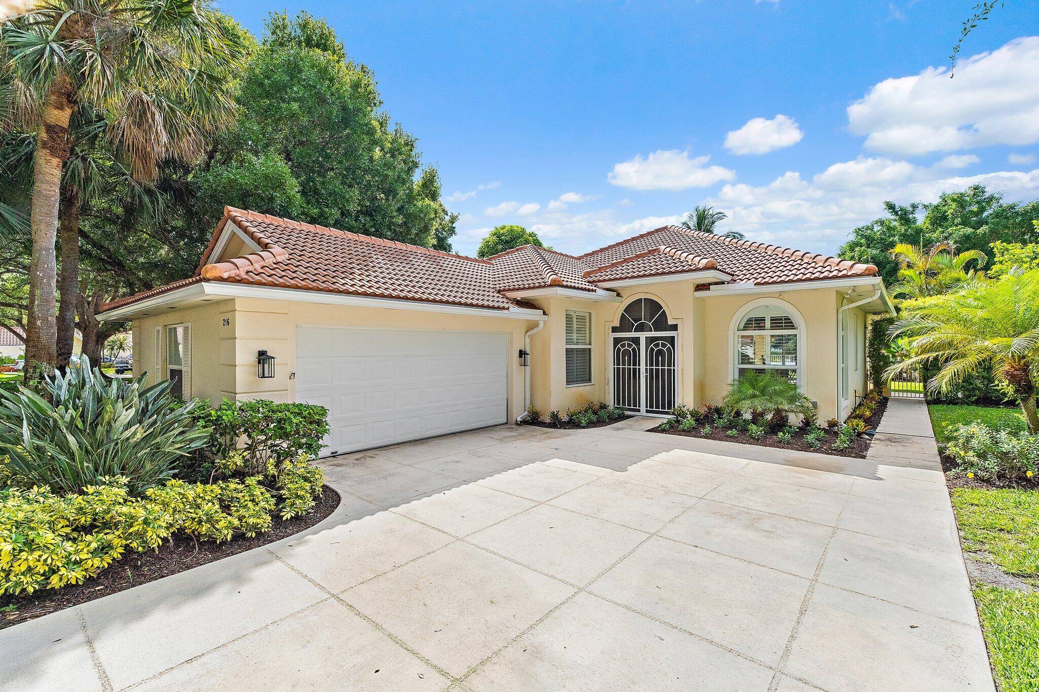 Beautifully appointed 3 bedroom 2 bath pool home sought after Oakmont model built by DiVosta on the pond in the serene gated community of Oaks East Palm Beach Gardens.