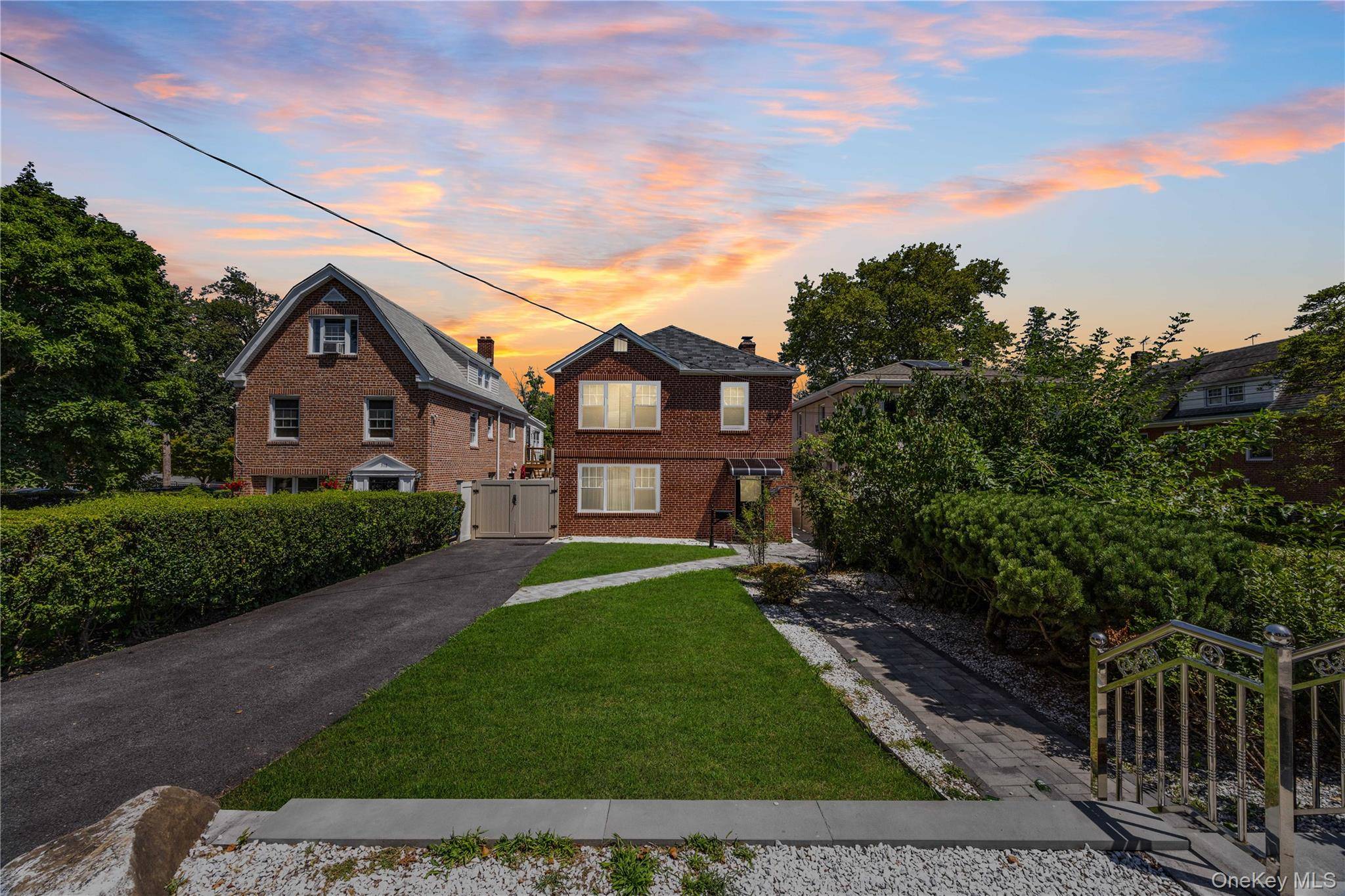 Custom detached brick home set back from the street on a 37.