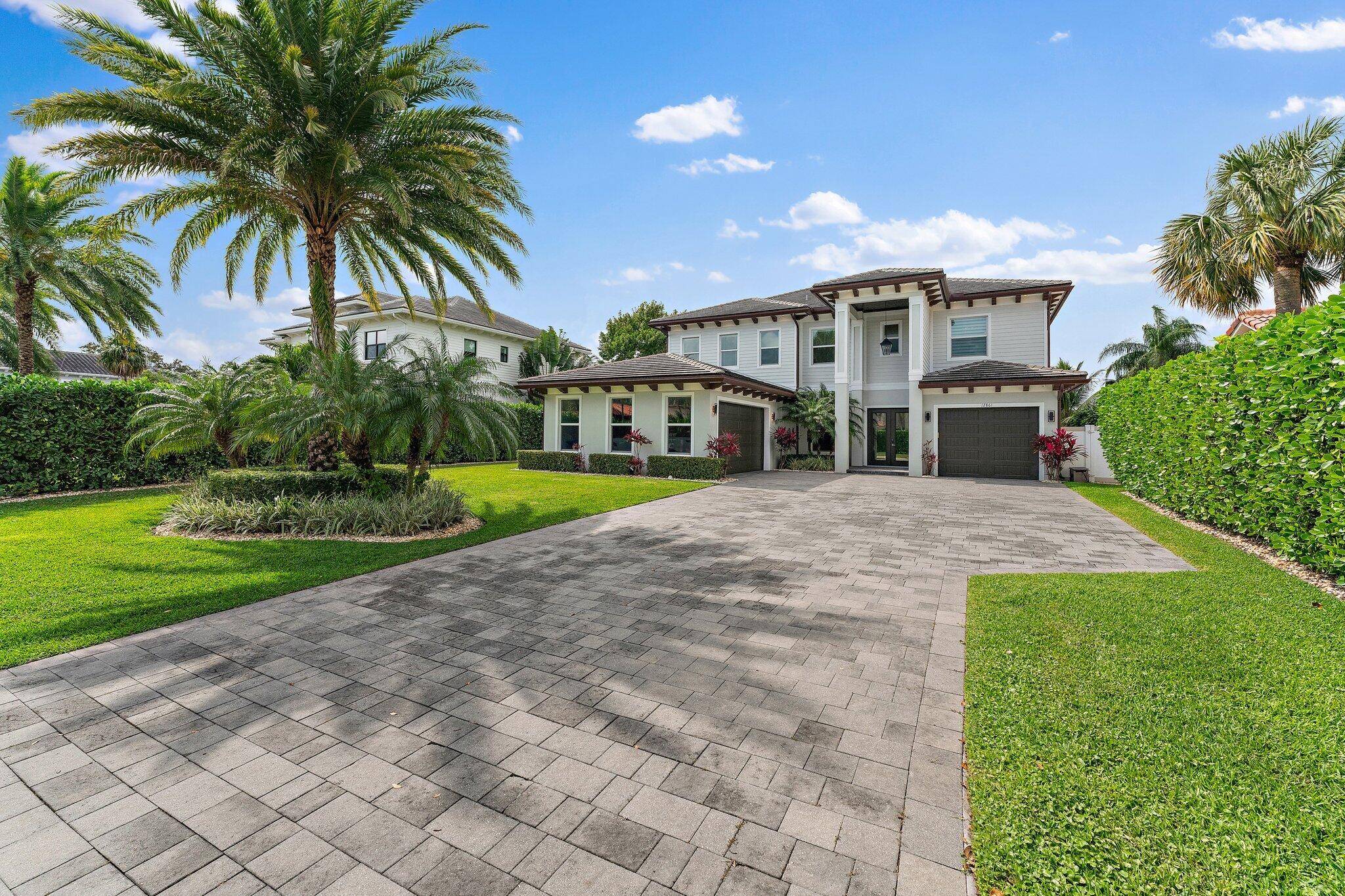 Move right into this stunning 2018 waterfront home in the heart of Palm Beach Gardens with no HOA.