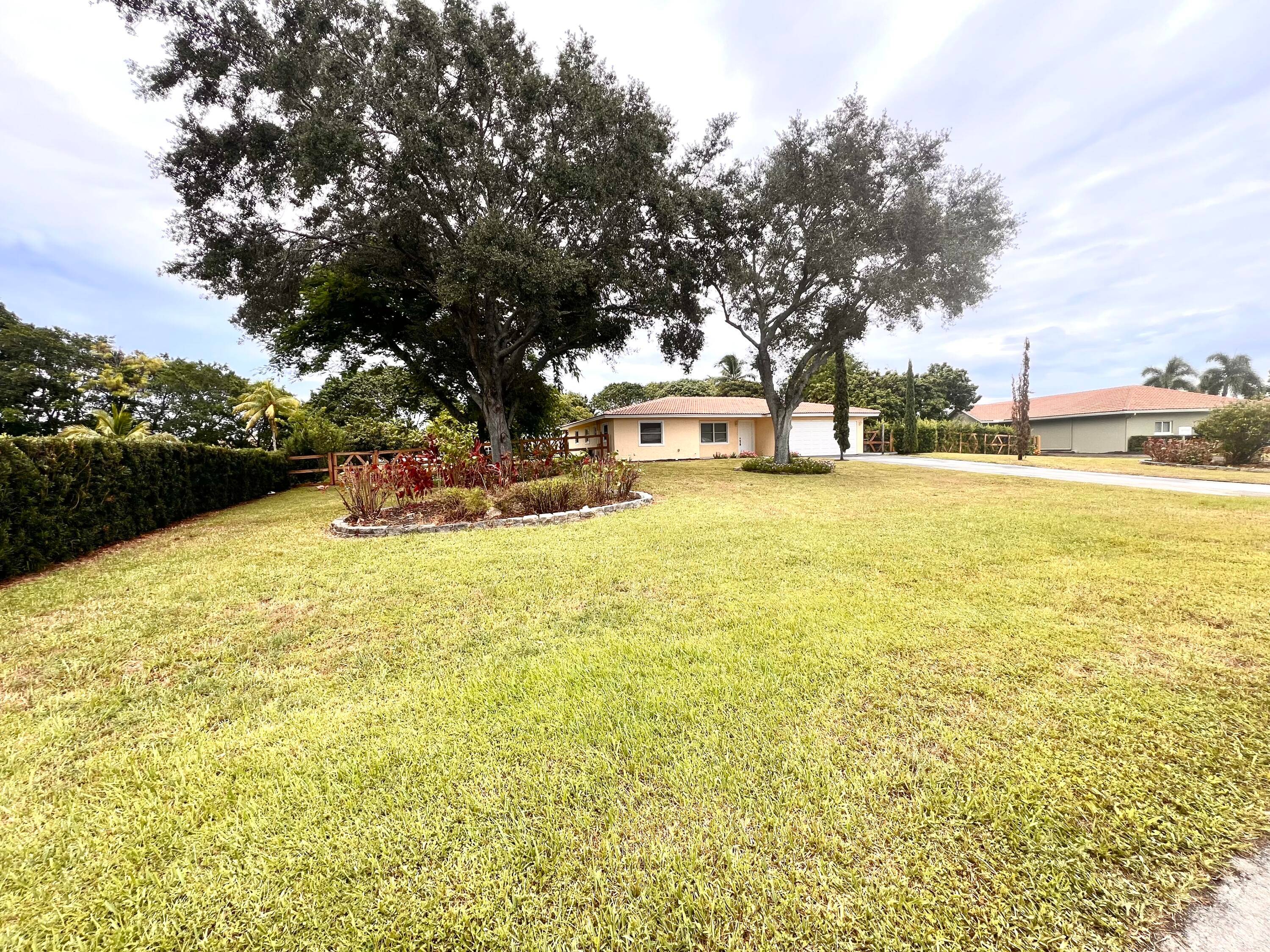 Experience lakefront living with this rarely available 4 bedroom, 3 bath home situated on a spacious 1 acre lot.
