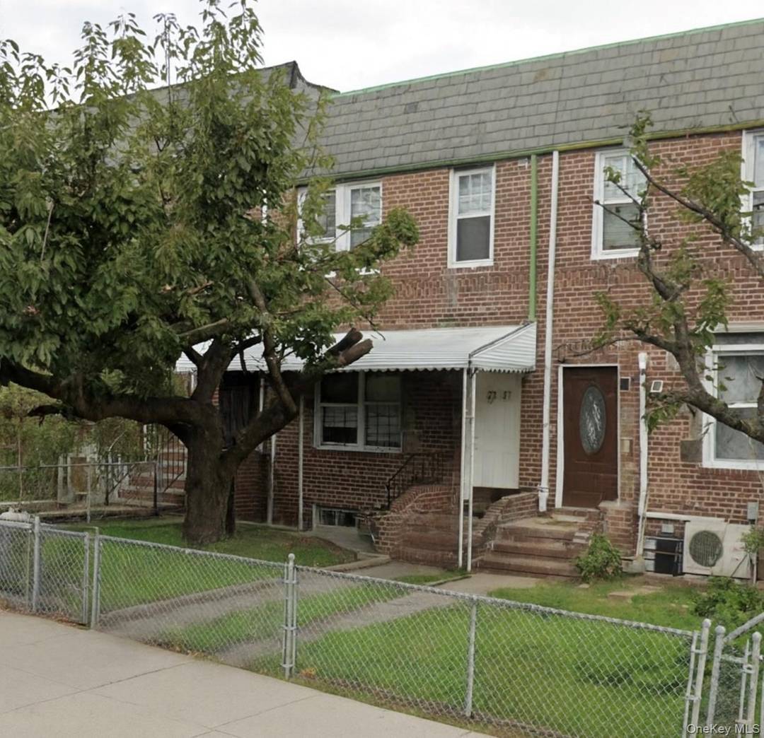 Welcome to 73 37 52nd Avenue, a beautifully maintained and recently renovated legal two family residence offering flexible living options and great investment potential.