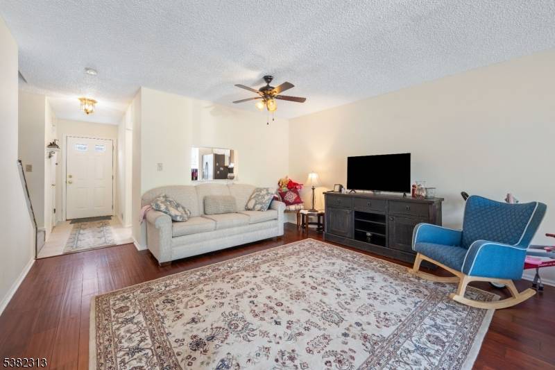 Beautifully maintained two story interior unit featuring 2 spacious bedrooms and 2.