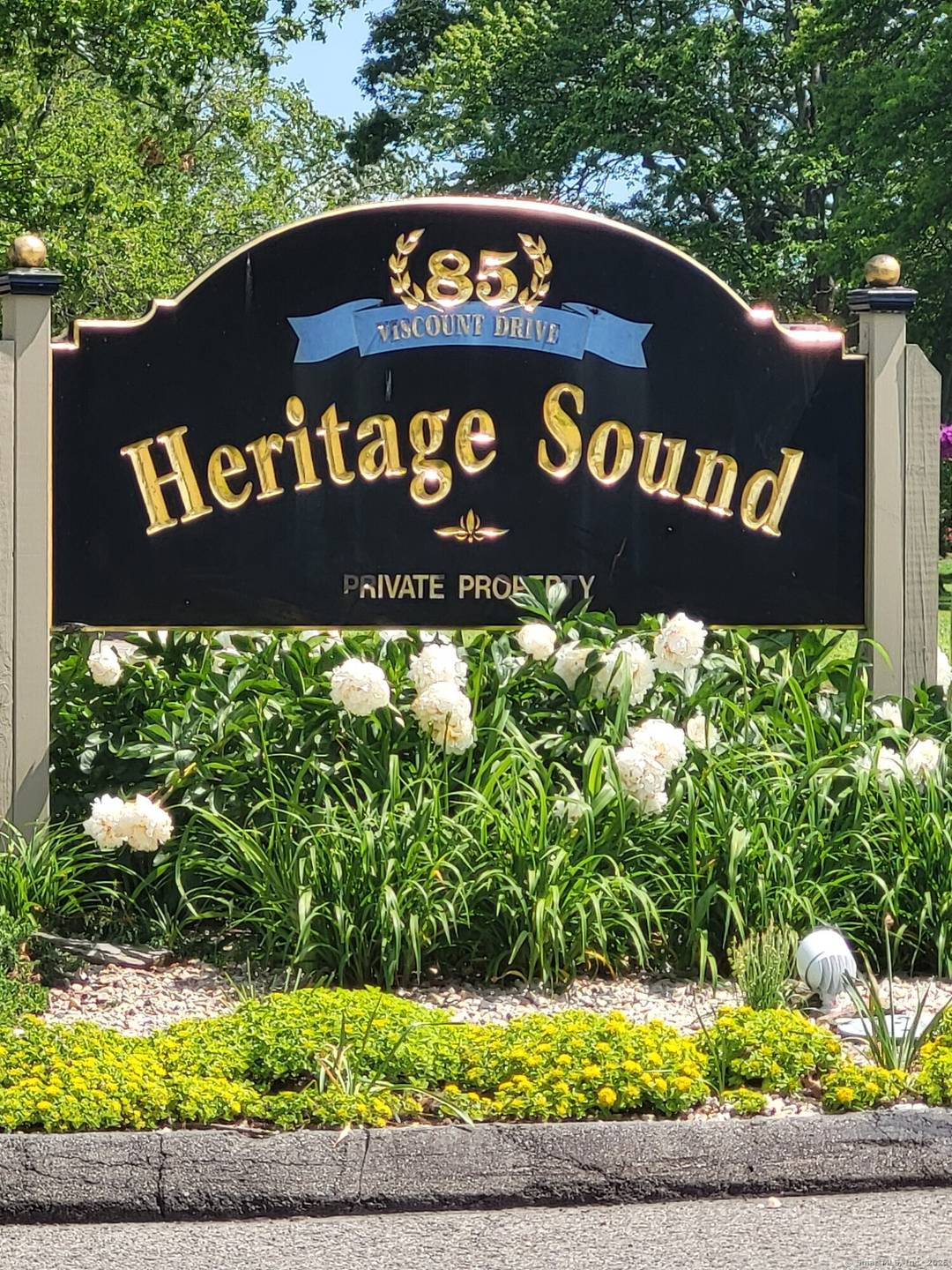 Heritage Sound Coastal Townhome Steps to Walnut Beach Snuggled in a quiet, private corner of the sought after Heritage Sound, a waterfront community, this beautifully updated end unit townhome offers ...