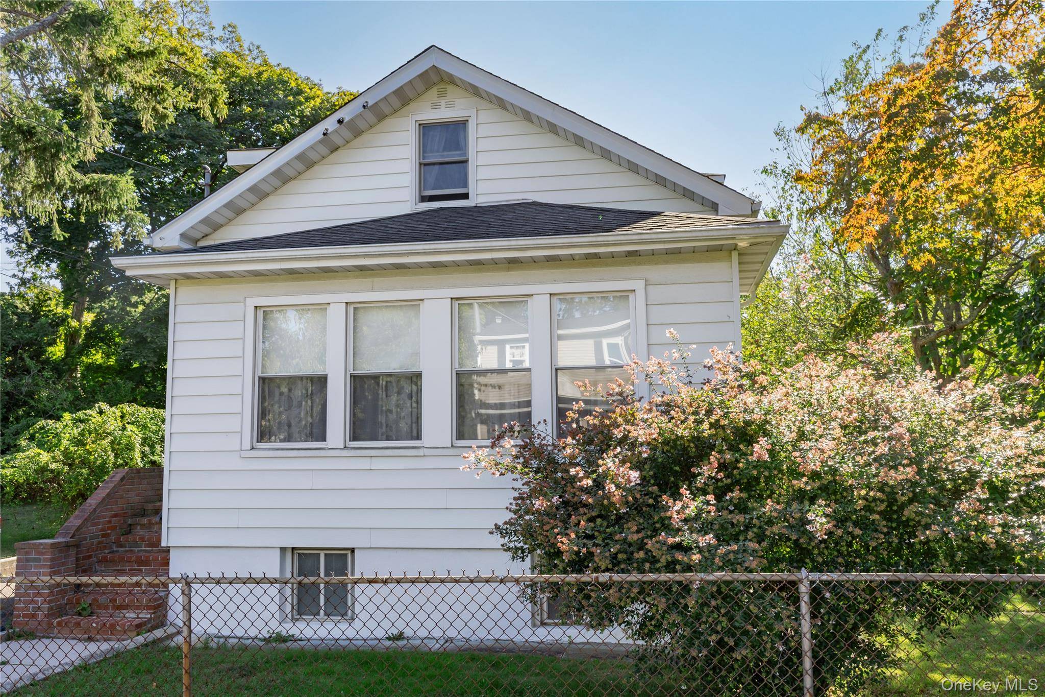 Beautifully updated home filled with natural light and hardwood floors throughout.