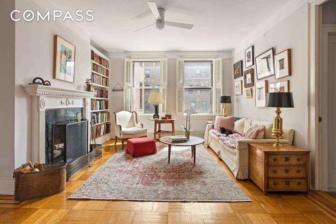 An elegant pre war aesthetic lives comfortably alongside modern renovations in this six room co op in the sought after historic district of Jackson Heights.