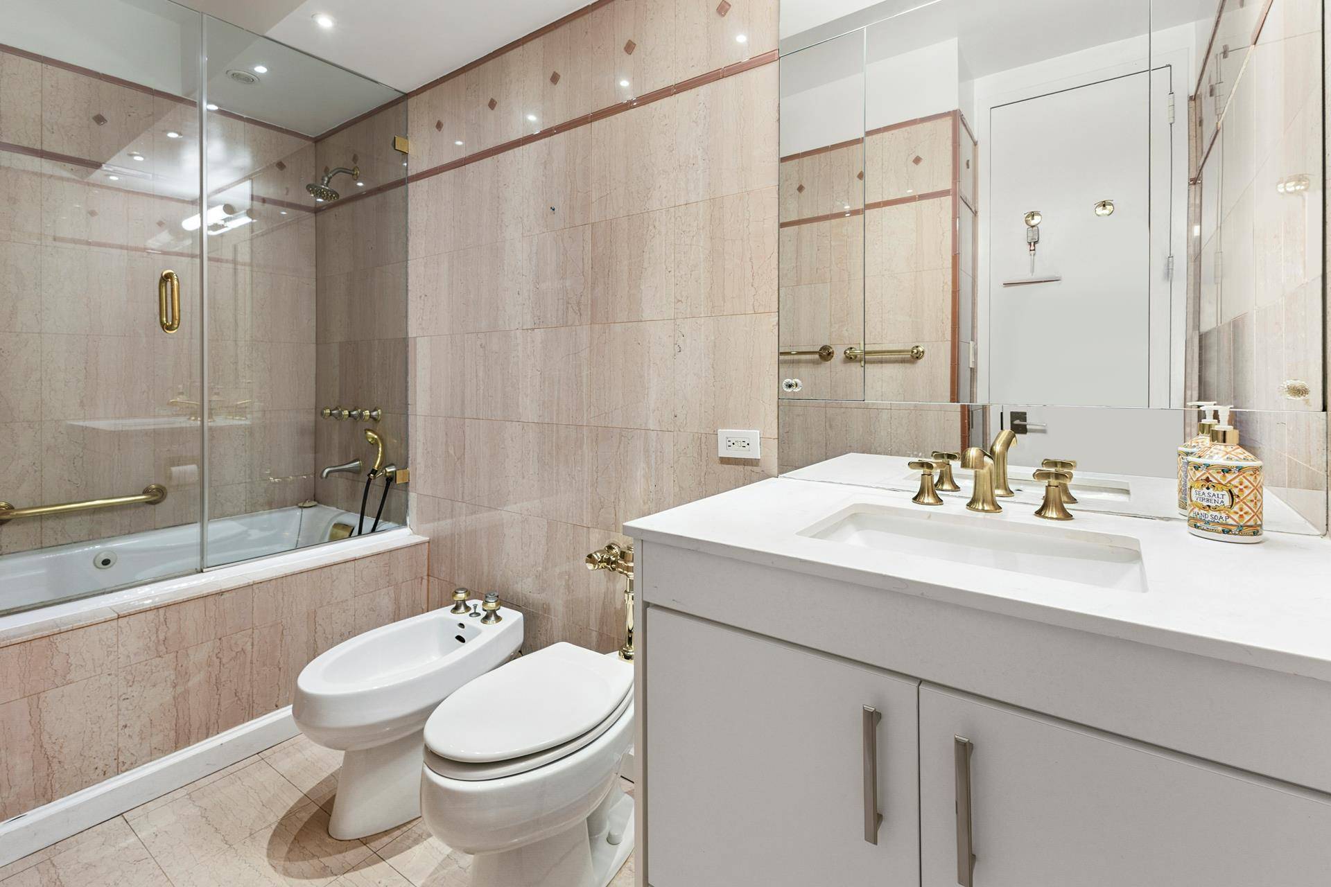 This beautiful corner residence combines classic prewar charm with modern functionality, offering an exceptional three bedroom layout rarely available in the building.