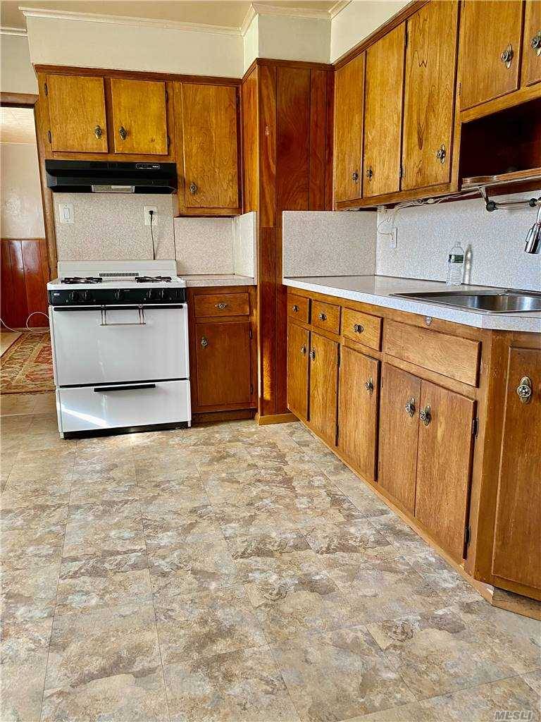 Sunny amp ; Bright 2nd floor, 1 bedroom apartment with formal dining room, Eat in Kitchen, large living room, small office, and full bath.