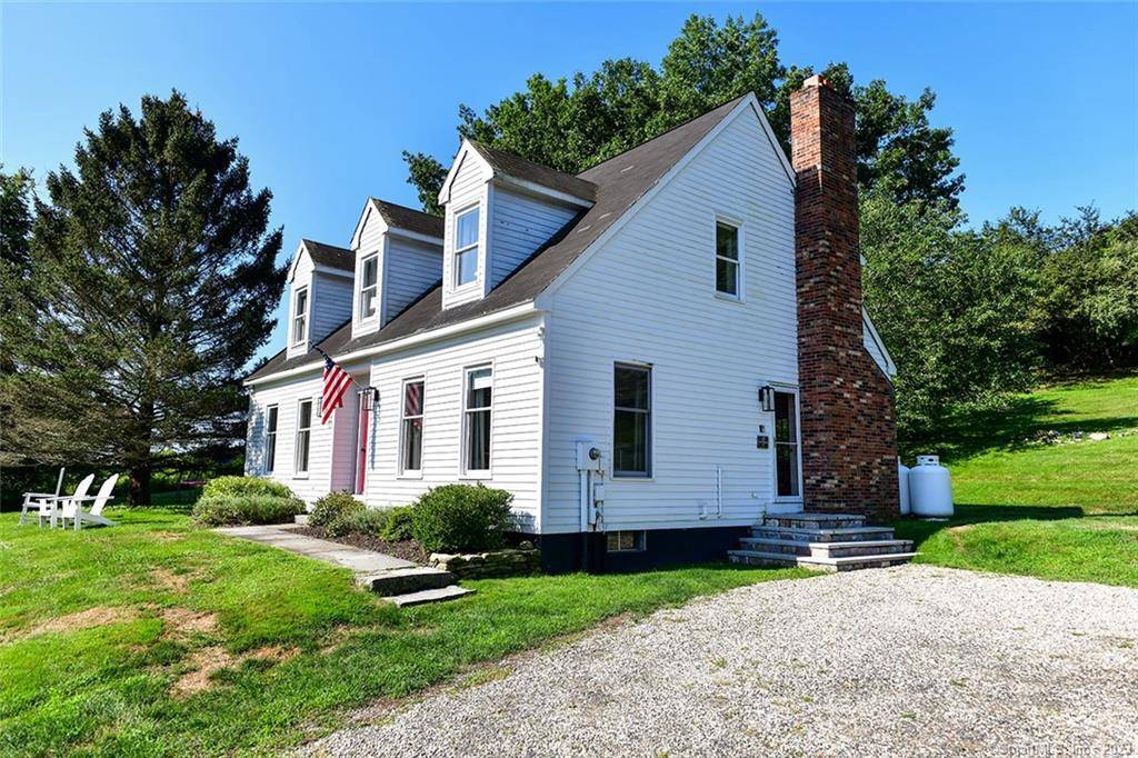 Pristine hilltop art filled home with views and only a short walk to Maple Bank Farm Stand, Toplands Farm and historic Roxbury Center.