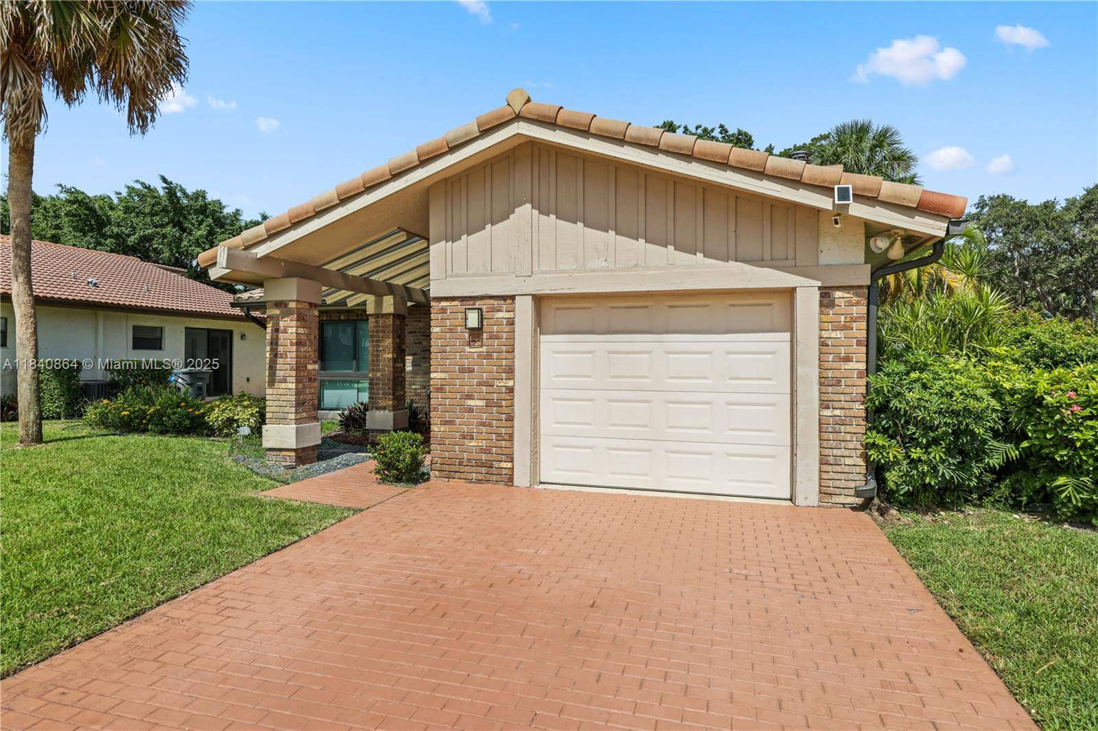 Tucked behind the gates of Boca Greens, this updated 2BD 2BA villa offers low maintenance living in a highly desirable location.