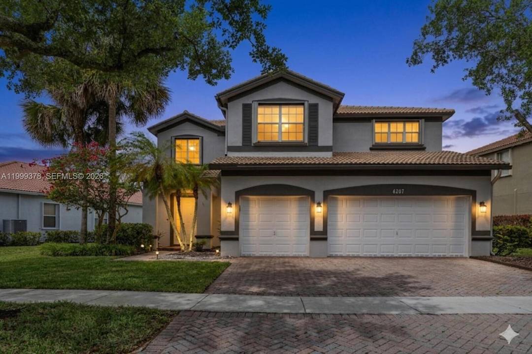 Bright and Spacious 5BR 4BA Home with over 3200sqft and 3 Car Garage in the Coveted Community of Isles of Weston.