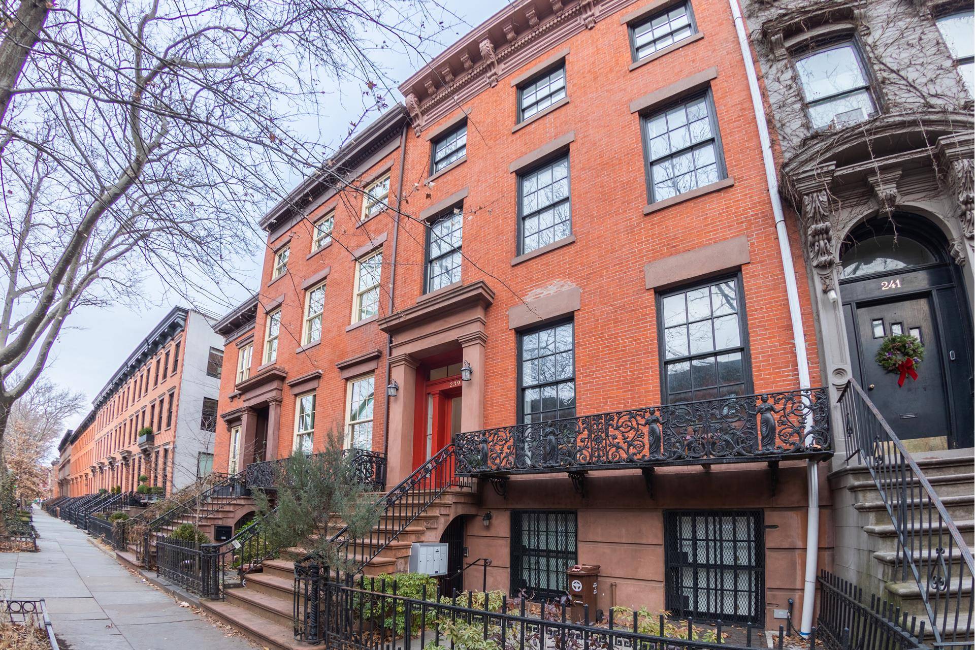 Just one block to Fort Greene Park this beautiful Greek Revival home dates to 1845 and is located on the most charming tree lined street.