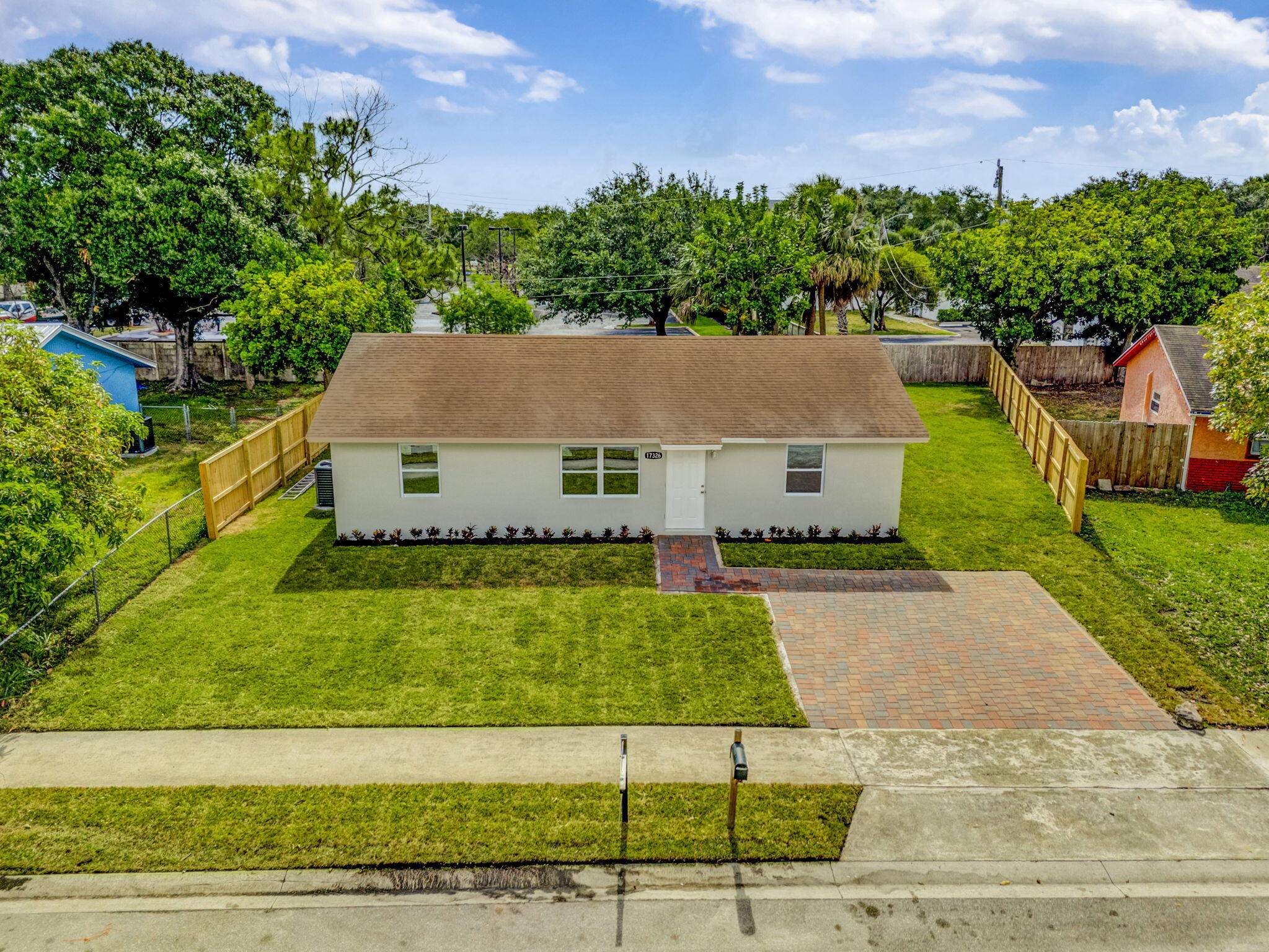 Welcome to this beautifully renovated 3 bedroom, 2 bath CBS home in the heart of Jupiter, offering modern style and peace of mind.