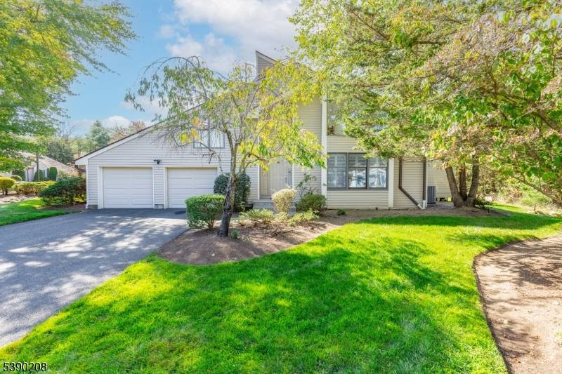 Live the Franklin Lakes lifestyle you've always imagined in this reimagined Mountain Shadows townhome.