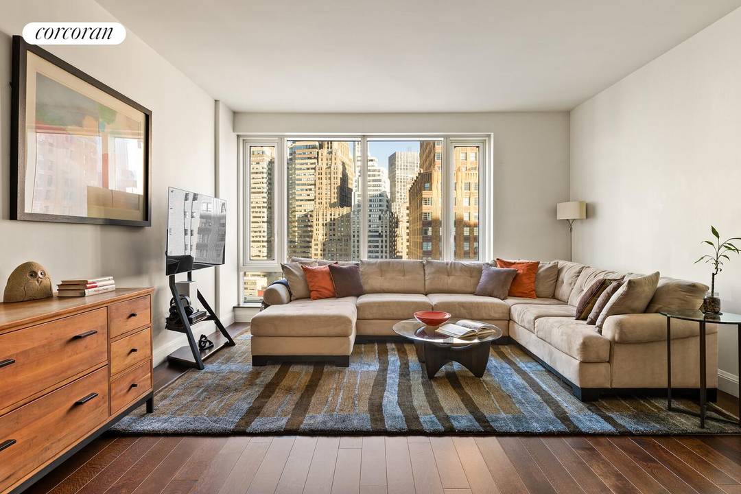 Perched on the 20th floor, this two bedroom apartment covers 1, 356 square feet and has a well planned layout.