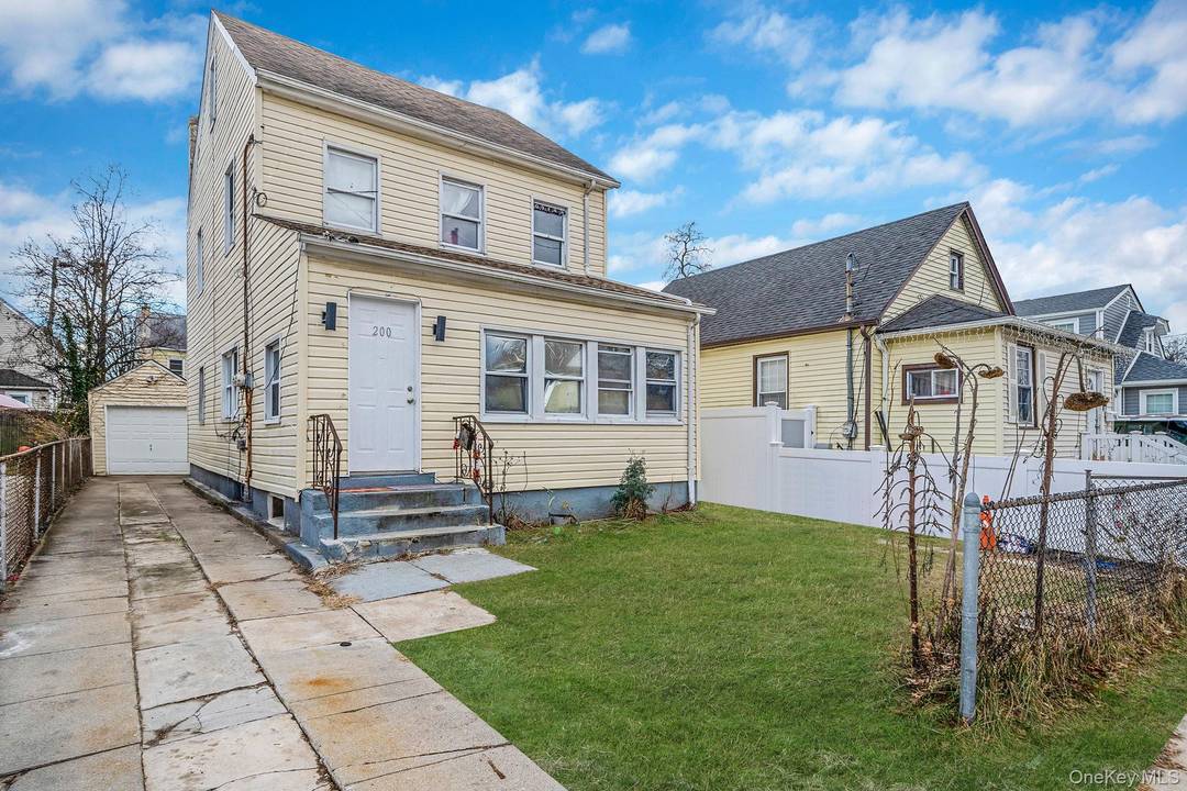 Welcome to 200 Princeton Street, Hempstead, a versatile and well cared for two family home that offers the perfect blend of comfortable living and income potential.