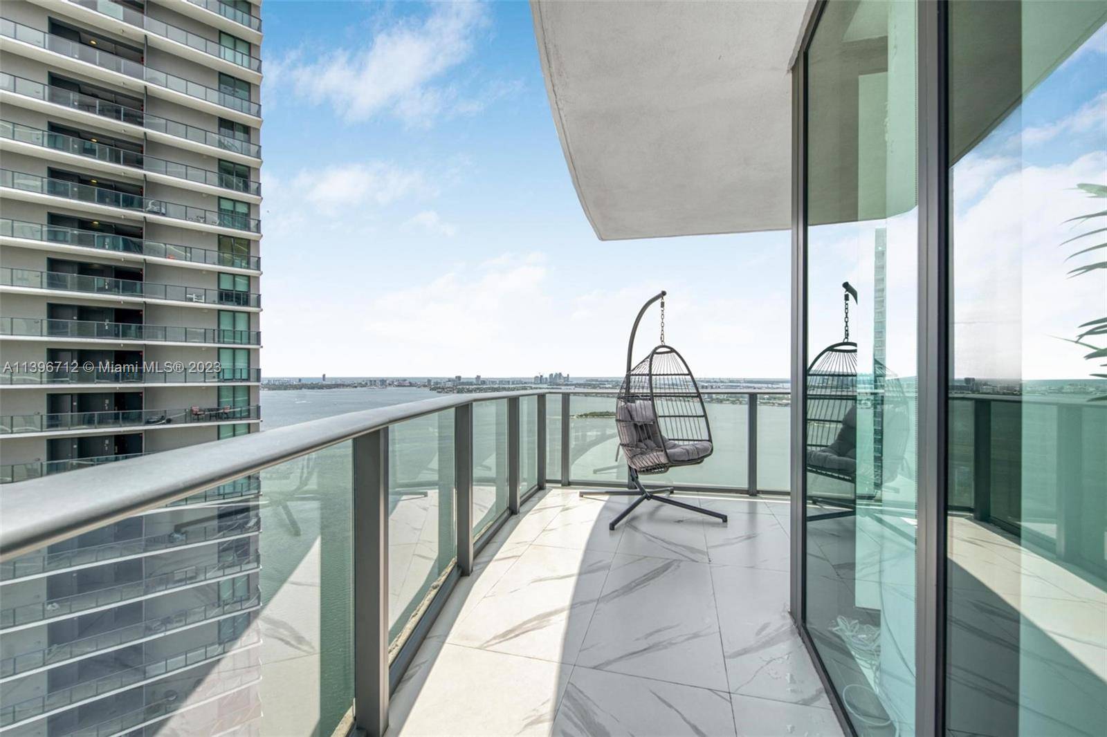 STUNNING 1 Bed Den 2 Bath furnished condo with direct unobstructed water views overlooking Biscayne Bay at Paraiso Bay !
