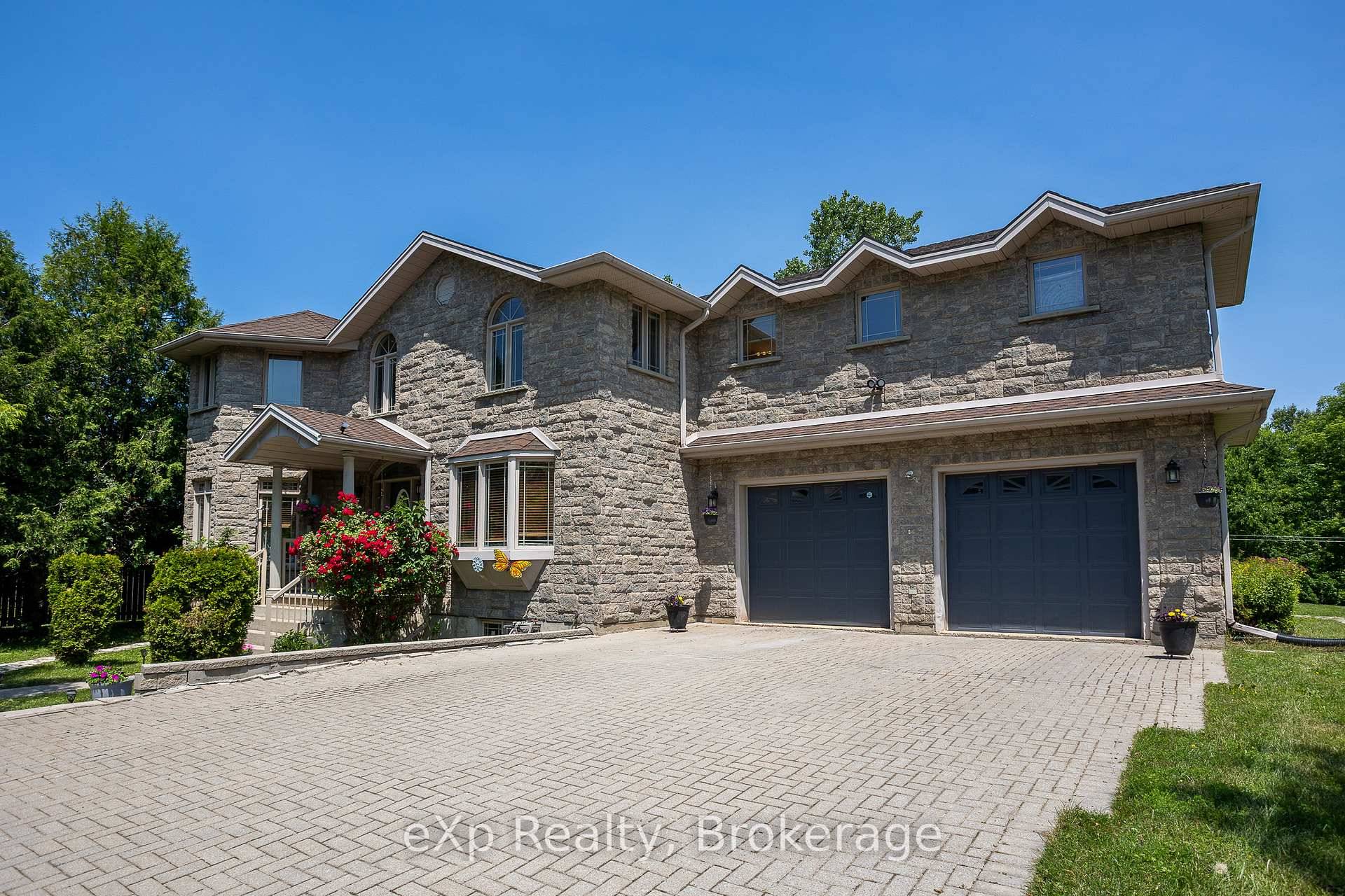 This spacious stone home offers over 3, 200 sq ft of finished living space, ideal for large families or multi generational living.
