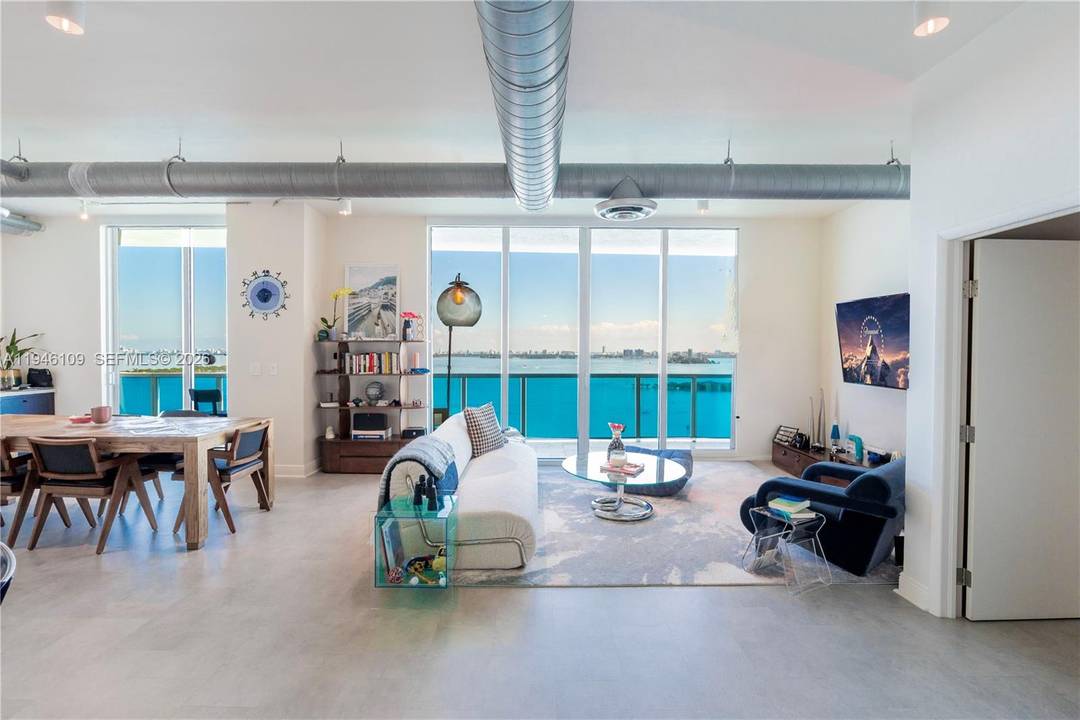 Beautifully renovated residence at Star Lofts featuring sweeping, unobstructed views of Biscayne Bay from every room.