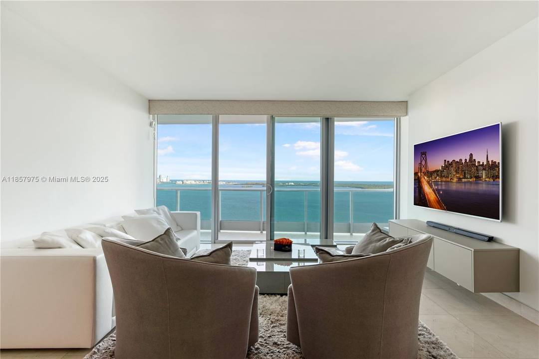 Stunning waterfront residence with breathtaking unobstructed views at the ultra luxurious Jade Brickell.