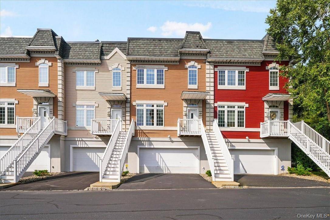 This exquisite townhouse is nestled within the highly sought after Versailles gated community.