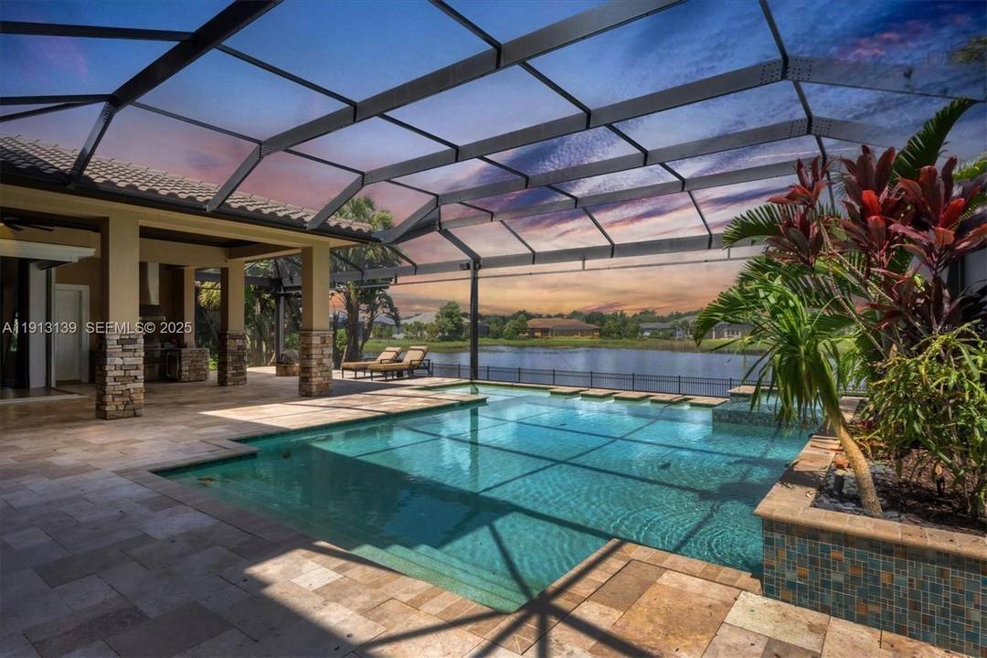 Luxury Estate Priced Below Market in The Concession Golf Club Exceptional value meets luxury living in this custom estate located in the prestigious, gated Concession Golf Club one of the ...