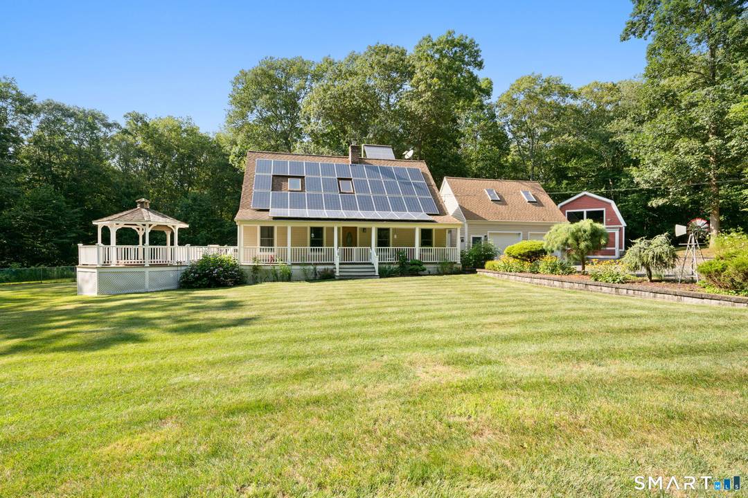 Nestled in the heart of East Haddam, this beautifully maintained Cape sits on 2.