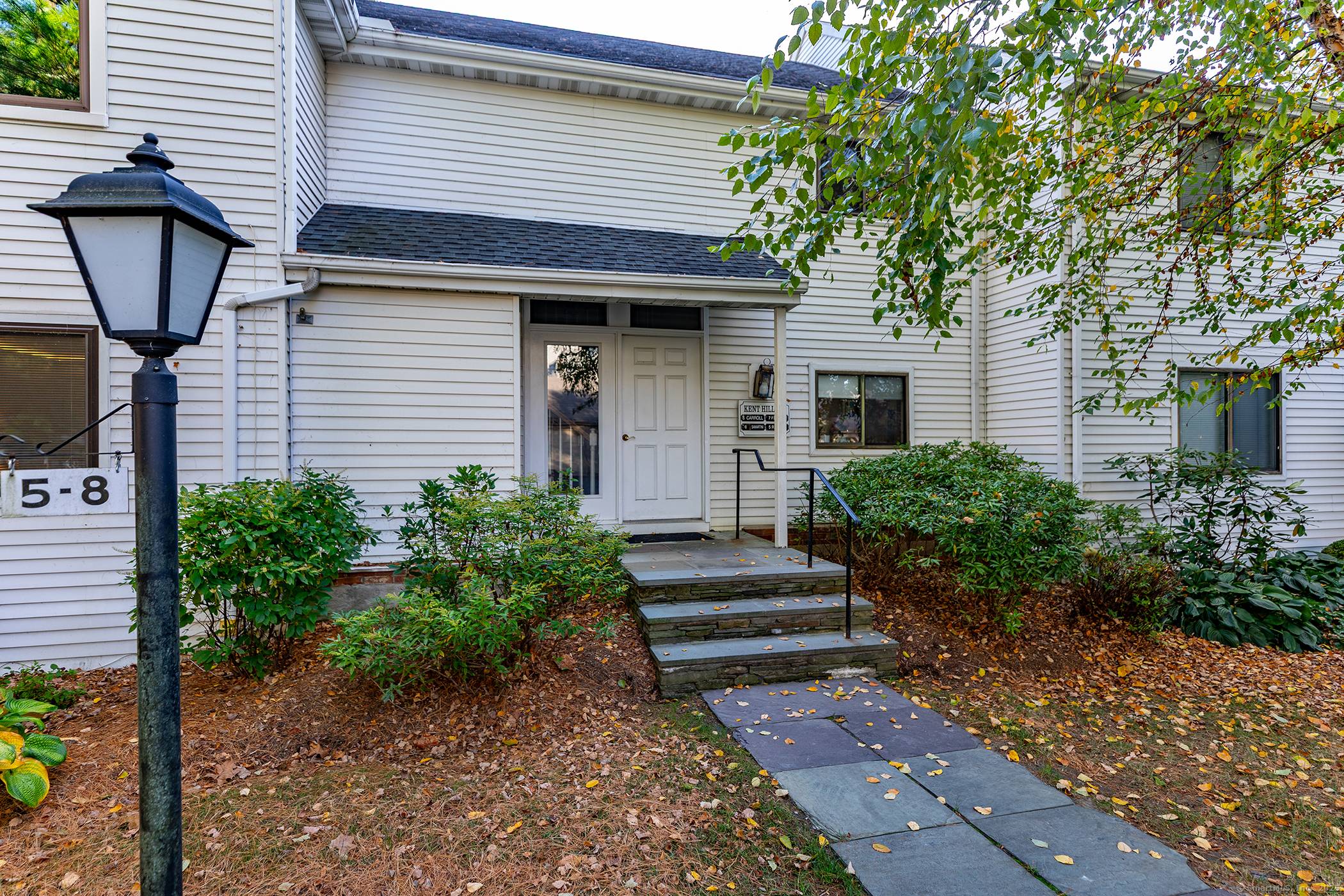 This highly sought after three bedroom, main level Kent Hills end unit has been fully renovated to showcase the perfect blend of luxury and modern functionality.