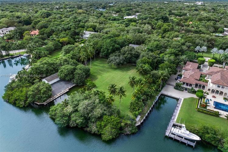 A rare chance to own the second largest parcel in Gables Estates, Coral Gables most prestigious community.