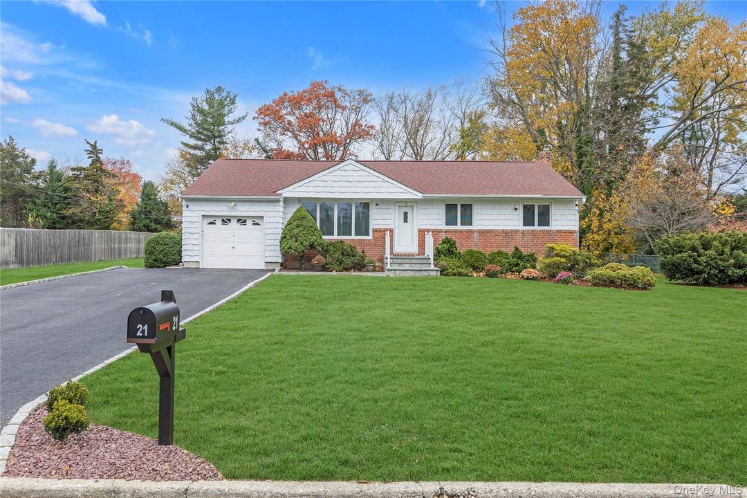 This charming and bright 3 bedroom ranch is set on a beautifully manicured.