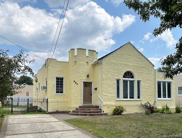 Completely gut renovated sun drenched Merrick Gables Ranch boasting gorgeous kitchen w white shaker cabinetry, quartz countertops, gas cooking, ss appliances, island dining and dining area, primary en suite plus ...
