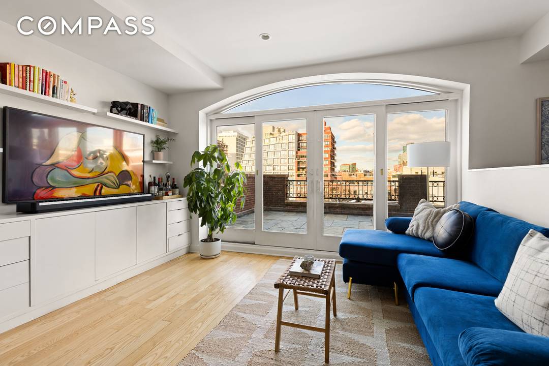 A two bedroom, one bathroom Park Slope condo with two private outdoor spaces including a sprawling terrace off the living room with jaw dropping city views and a balcony off ...