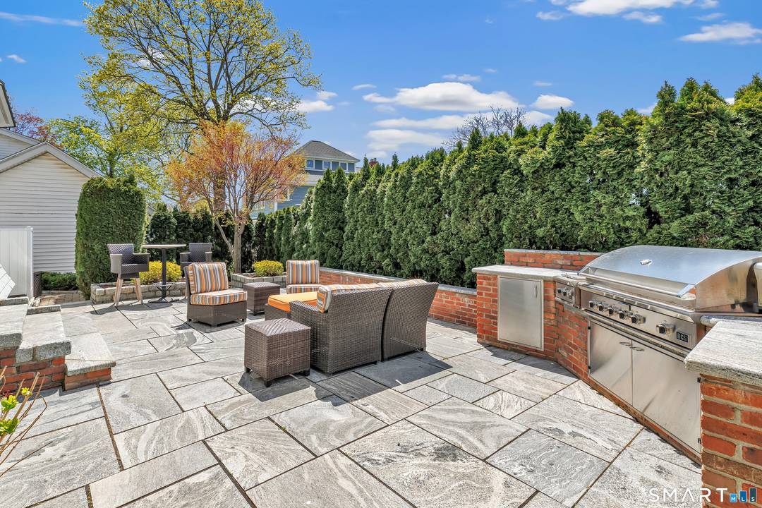 Set within the private Laurel Beach community, this exceptional coastal home offers a refined blend of luxury and lifestyle just steps from the beach.