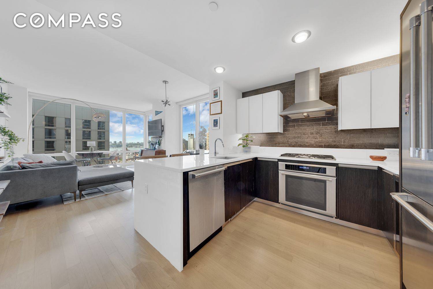 FIRST ACCESS WED. JUNE 18th OH BY APPT 12 1PM Welcome to modern luxury on West 46th Street, Manhattan, NY, where sophistication meets smart living.