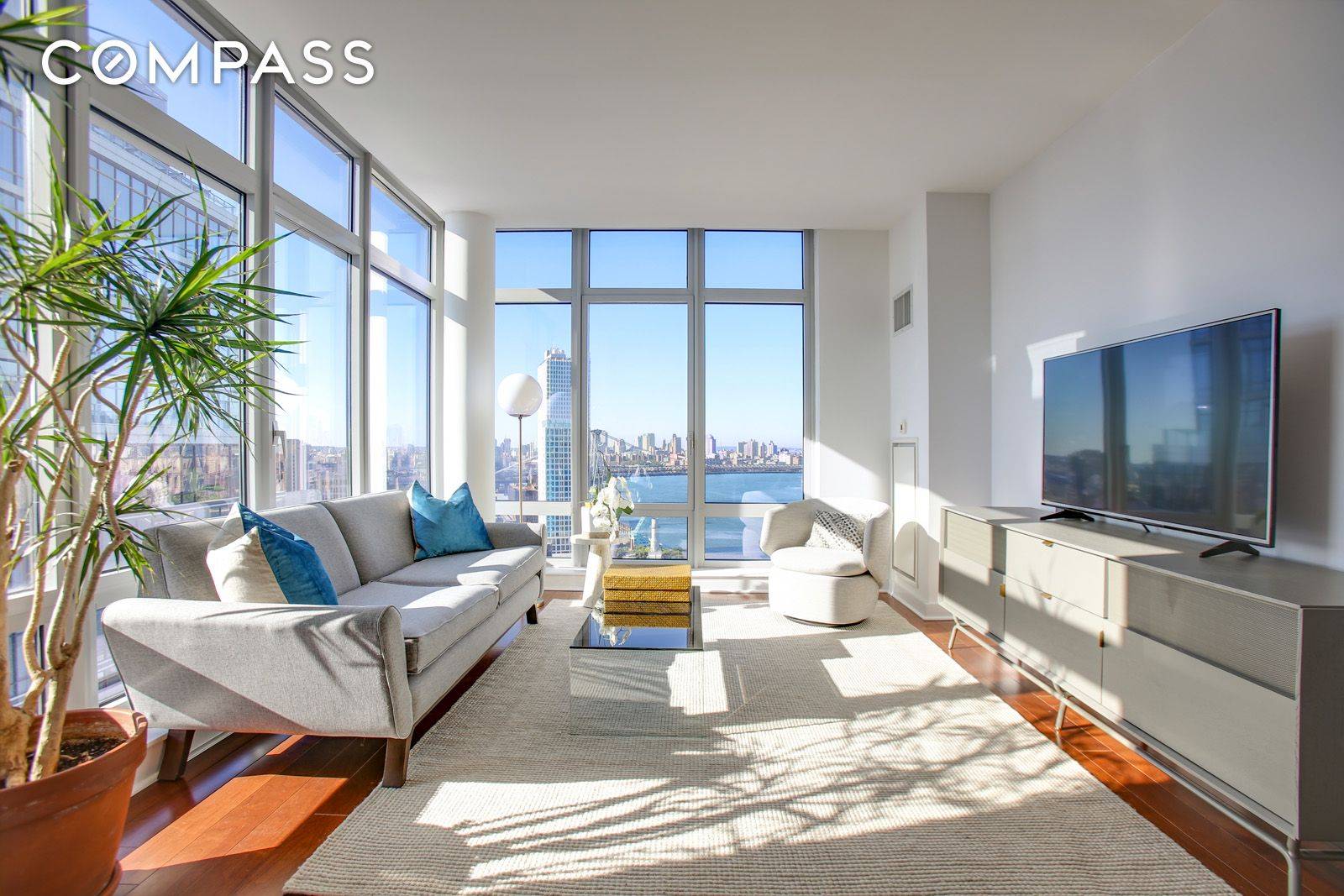 Enjoy stunning views of the Williamsburg Bridge and Downtown Manhattan from every room in this high floor, luxury 2 bedroom home with a private balcony at 2 Northside Piers.