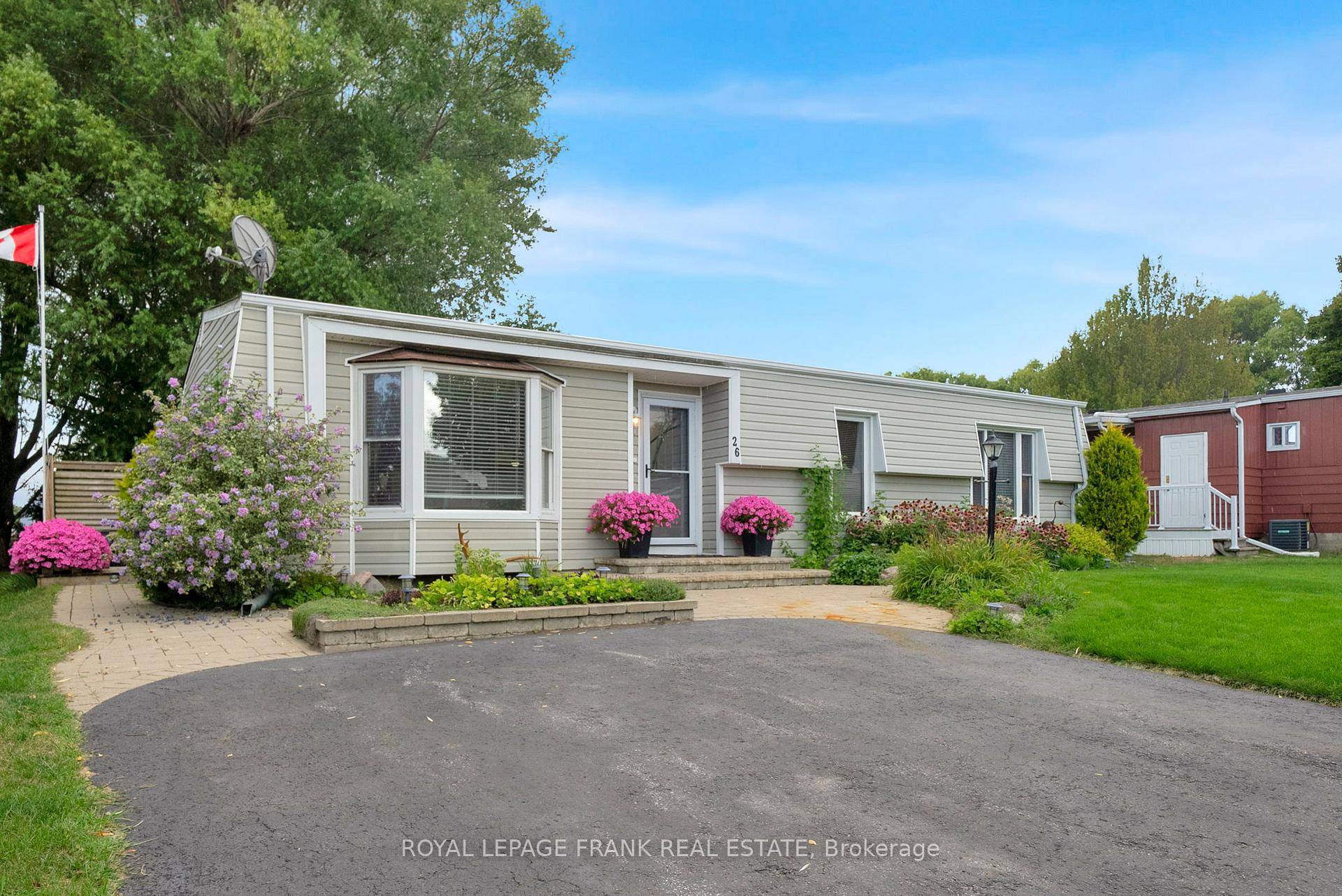 Discover a vibrant lifestyle in this beautifully updated 2 bedroom bungalow located in the heart of the sought after Wilmot Creek gated adult community along the shores of Lake Ontario.