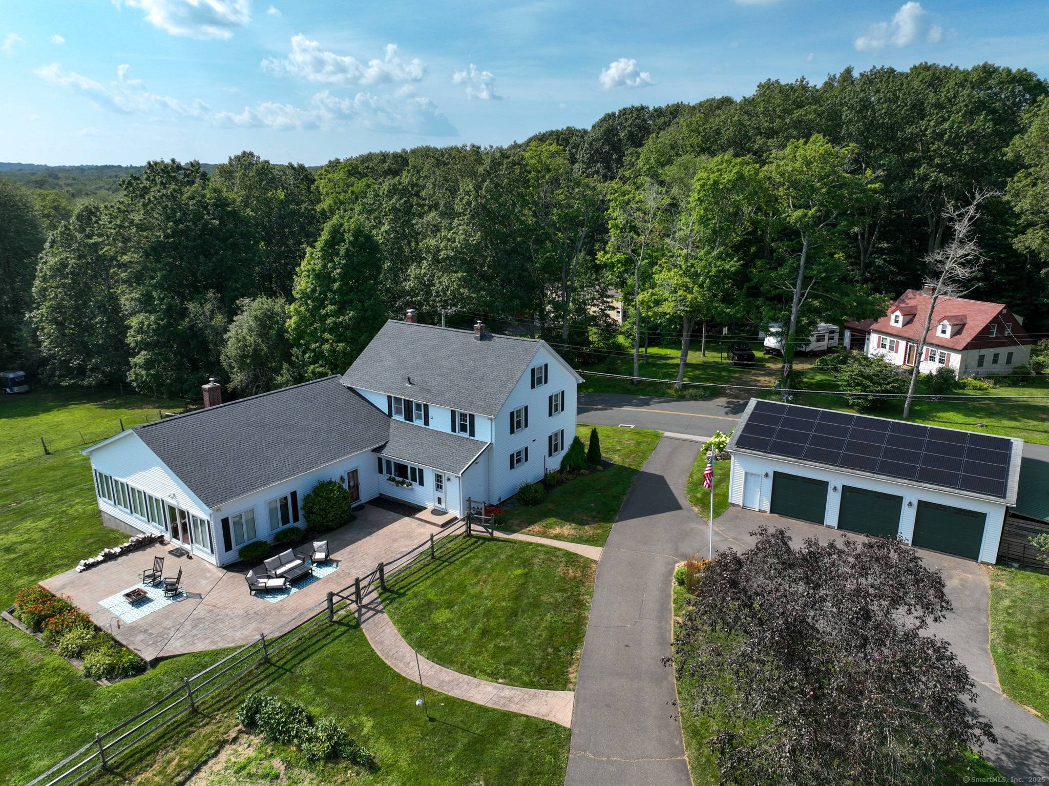 Includes Approved Building Lot Endless Possibilities Await Set on 5 private acres with access to the Bolton Land Trust Trails, this 4 bedroom, 2.