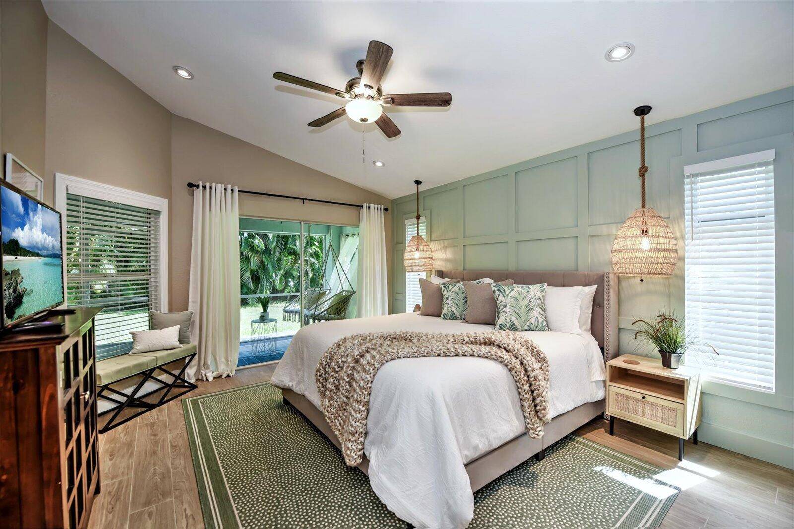 Nestled on a peaceful street in SW Cape Coral's desirable Pelican neighborhood, this stunning coastal retreat offers the perfect blend of modern sophistication and beach inspired charm.