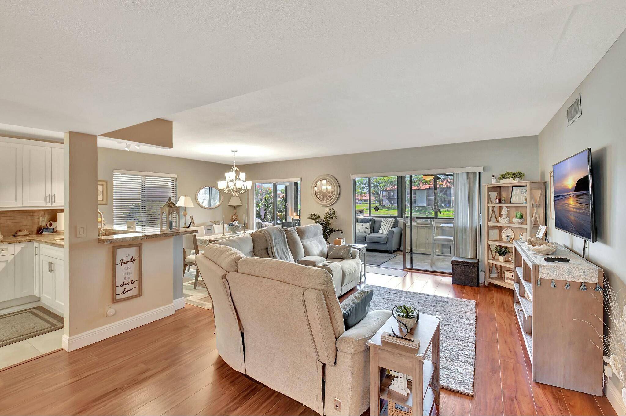 BREATHTAKING LAKE VIEWS. This exquisitely renovated 2 bedroom den optional 3rd bedroom condo is a move in ready masterpiece, perfectly nestled in a breathtaking lakeside setting.