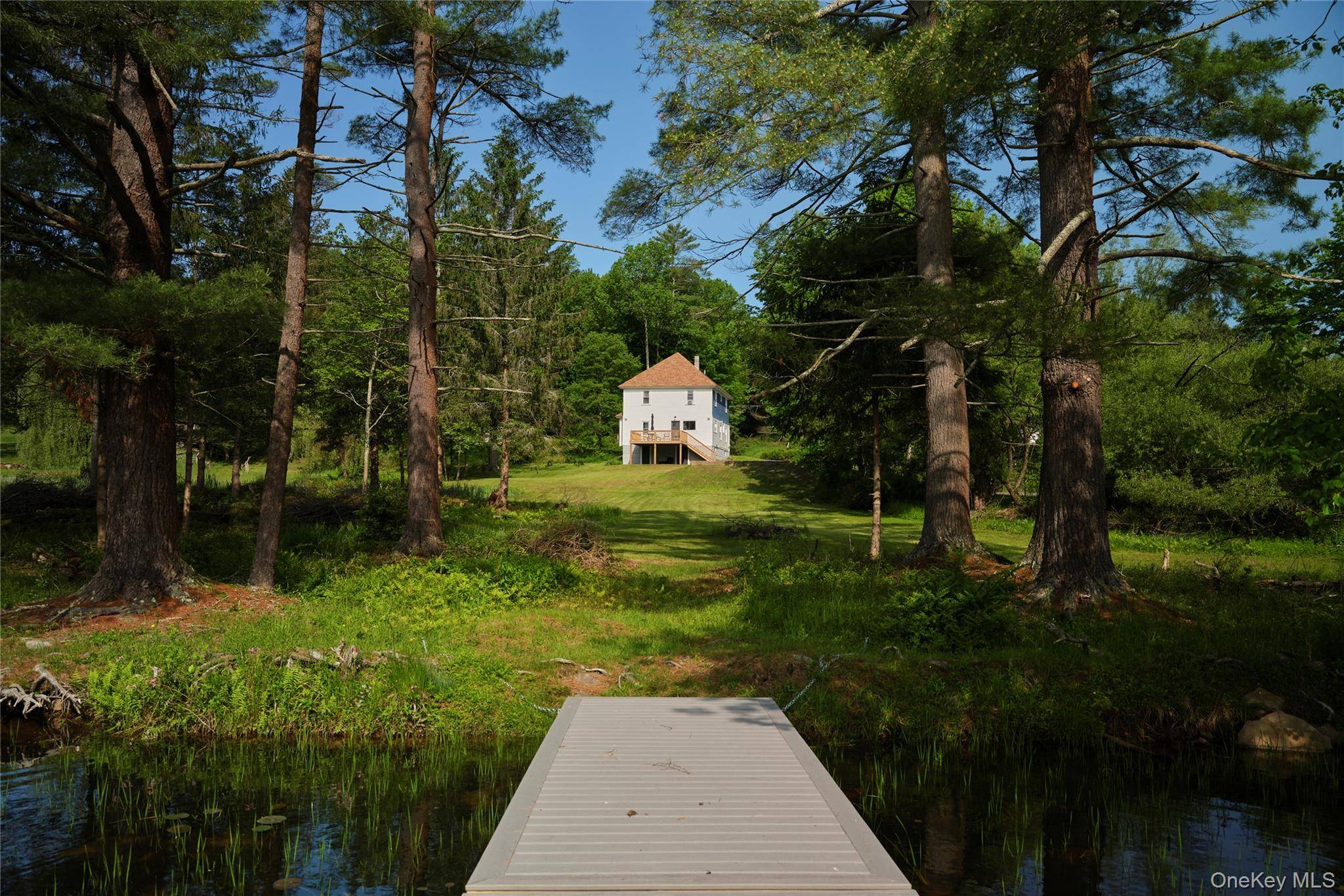 Welcome to Kenoza Blue, a turnkey home with classic lines, ample space, and 160 feet of lake frontage on one of Sullivan County s finest private lakes.
