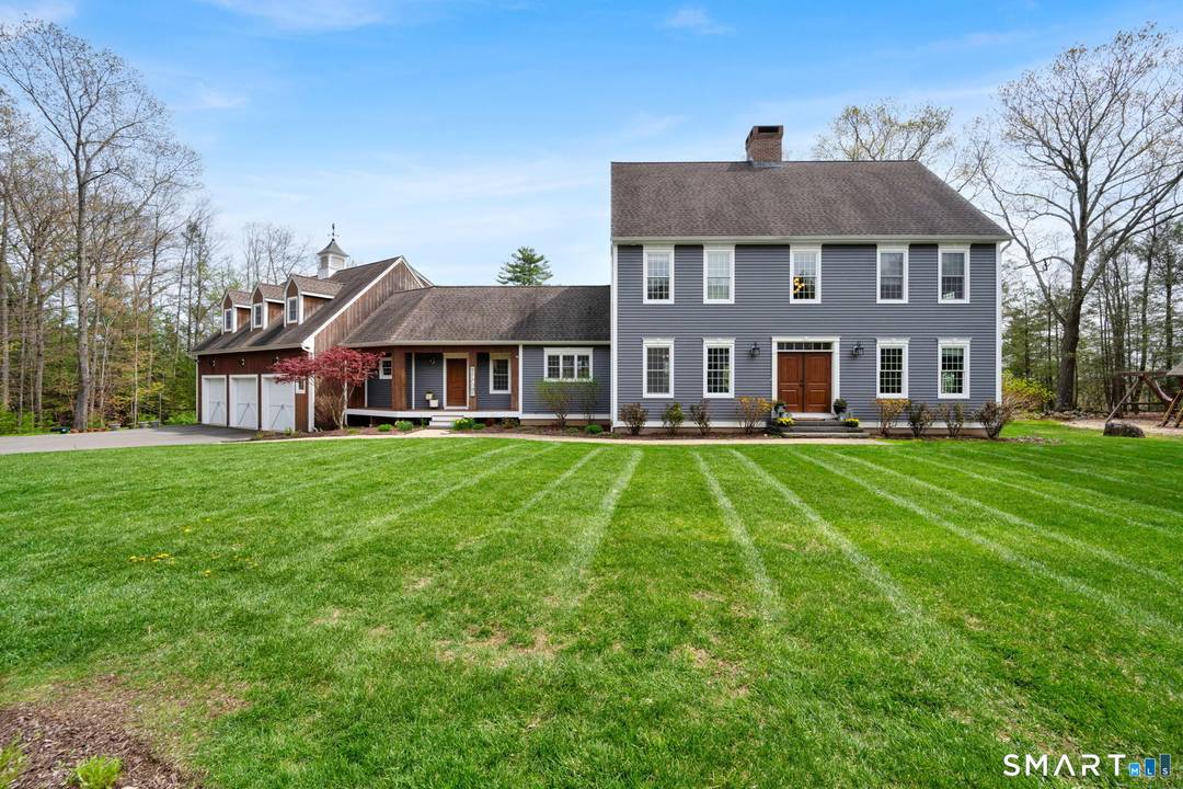 Experience the ultimate private sanctuary in this meticulously updated 4 bedroom modern colonial, gracefully set on over four acres of pristine, park like grounds.