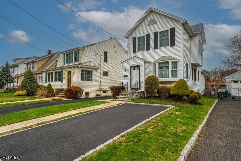 Welcome to this charming 3 bedroom, 2 full bathroom Colonial nestled in the heart of Garwood.